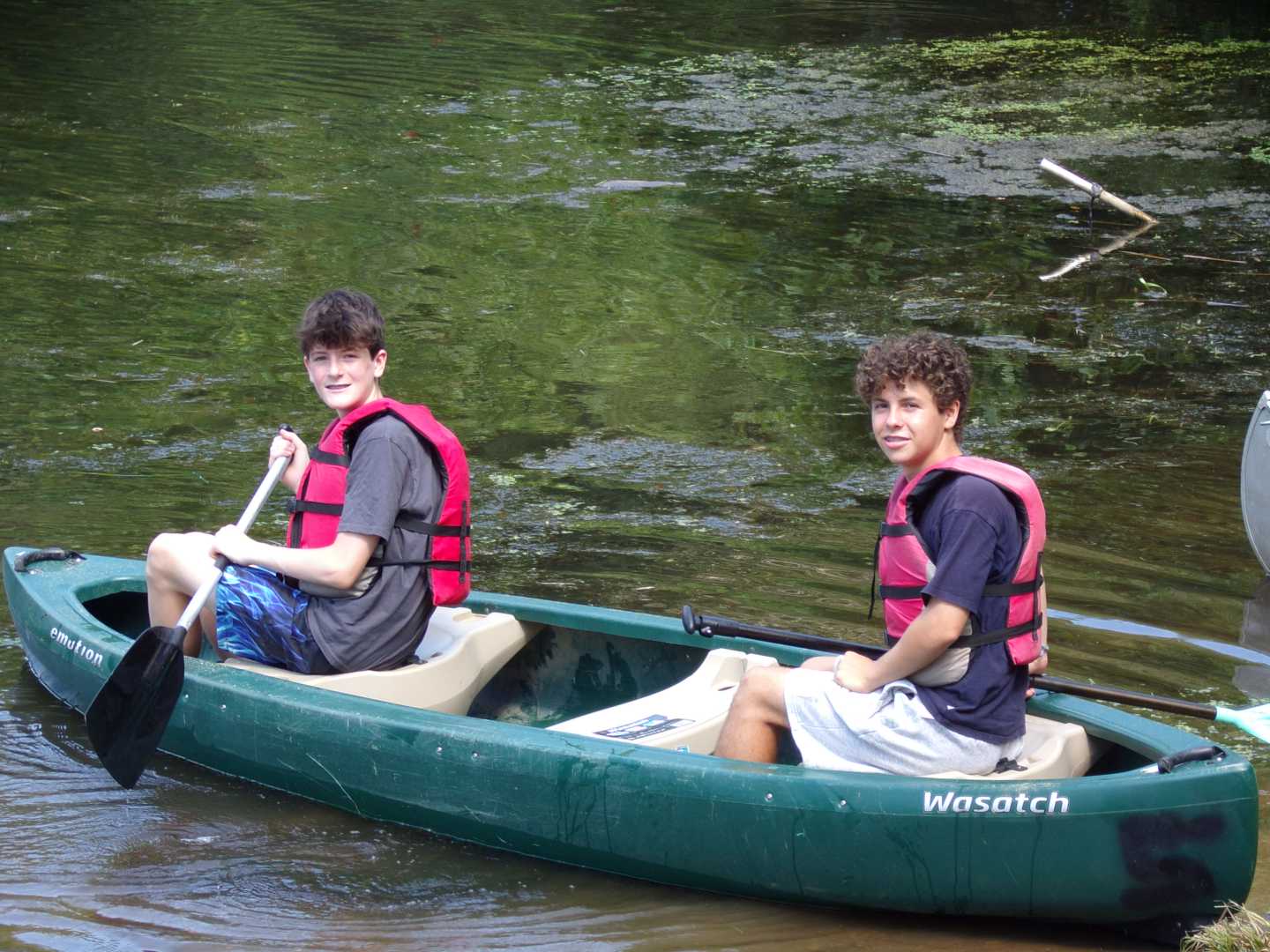 Two Camp Tall Timbers campers in a canoe
